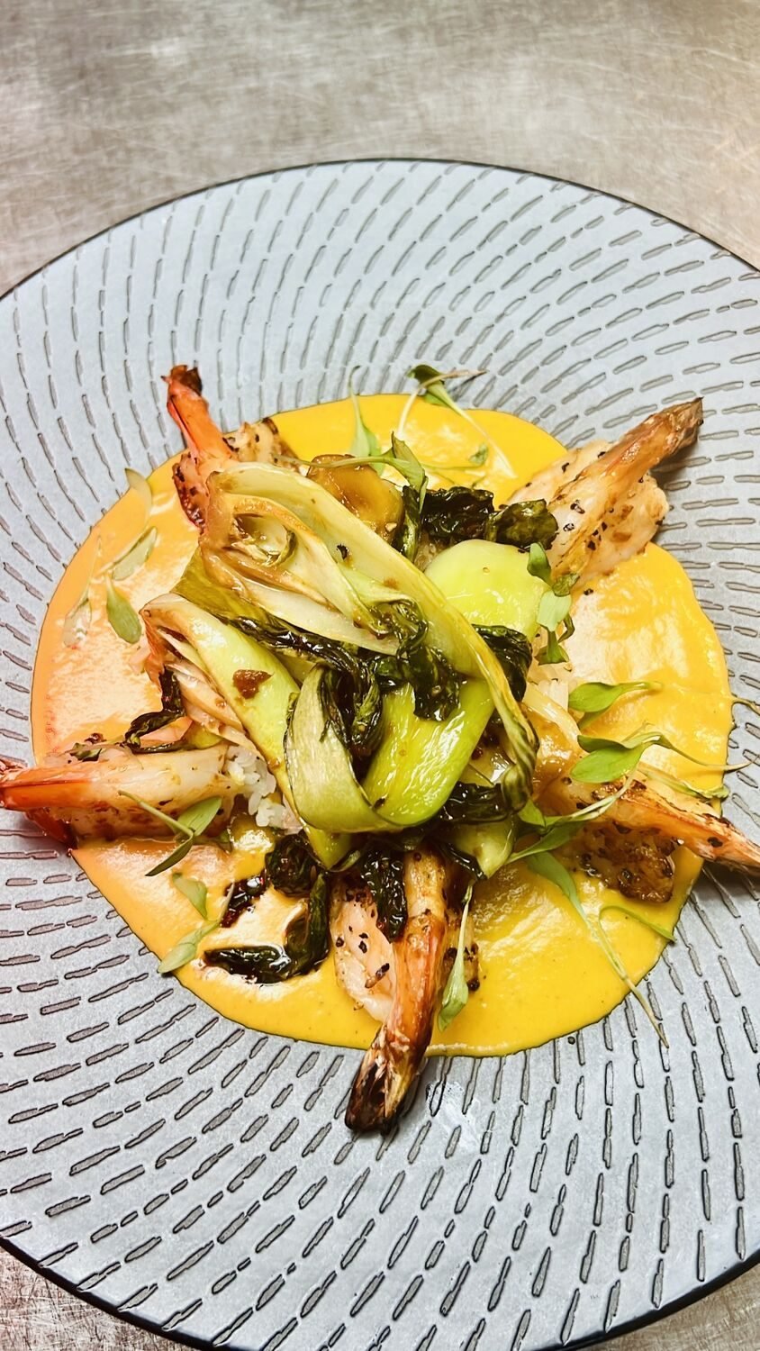 Grilled shrimp with bok choy over squash puree